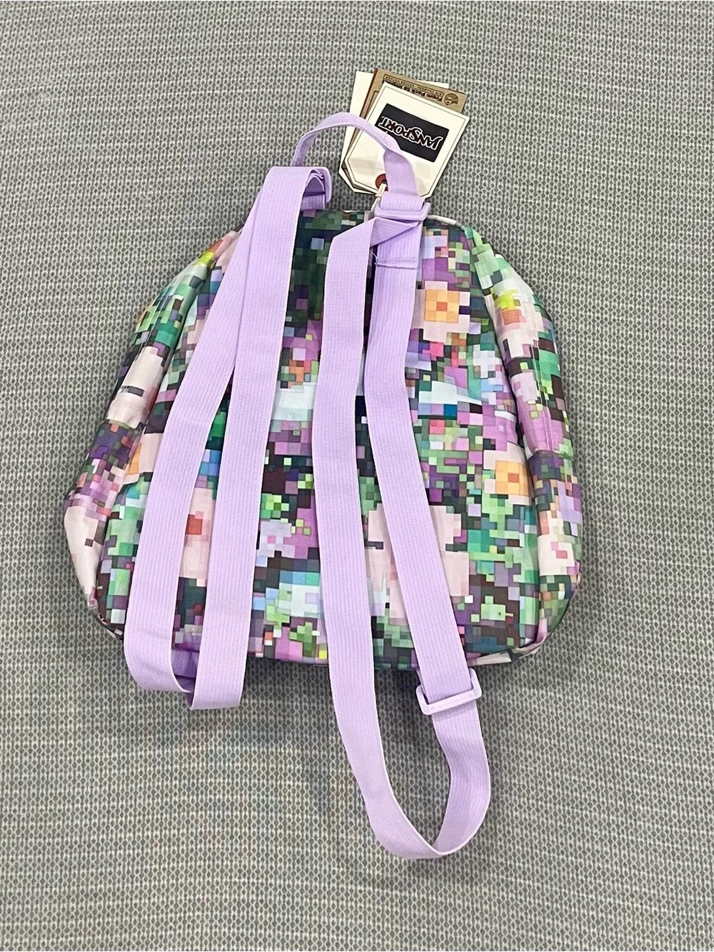Jansport Pixel Print Mini Backpack in Lavender and Multi